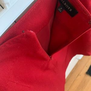 Red skirt. Size 6. Zipper in the back.